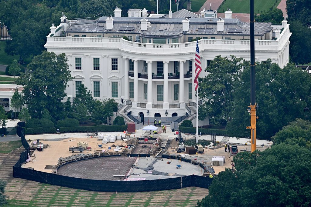 Directly in front of the White House is construction of a new helipad to support the latest version of Marine One for the president. The White House is directly behind it. 1600 Pennsylvania Ave NW, Washington, DC 20500. July 10, 2026.