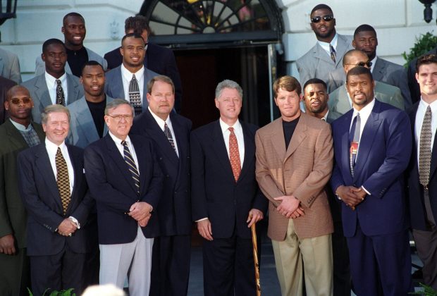 Photo of w:Bill Clinton meeting with the w:Green Bay Packers, who won the w:Super Bowl the year before.