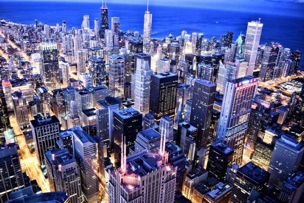500px provided description: Chicago Skyline at dusk taken from Willis Tower Observatory. [#street ,#downtown ,#buildings ,#vacation ,#cityscape ,#long exposure ,#holiday ,#lake michigan ,#Travel ,#City ,#USA ,#Chicago ,#Skyline ,#Illinois ,#America ,#Skyscraper ,#Trump Tower ,#The loop]