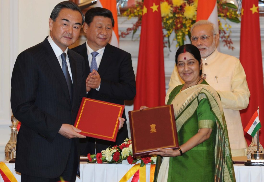 In New Delhi on September 18, 2014, the Prime Minister, Narendra Modi and the Chinese President, Xi Jinping witnessing the signing of an memorandum of understanding between their foreign ministers Sushma Swaraj and Wang Yi. This memorandum opens an alternative Hindu pilgrimage (yatra) route, named "Kailash-Mansarovar yatra". While both Mount Kailash (冈仁波齐峰) and Lake Mansarovar (玛旁雍錯) are situated in Tibet Autonomous Region of the PRC, the only route as of 2014 goes via the Lipulekh Pass (里普列克山口). A new route that goes through Nathu La (乃堆拉山口) was opened in 2015 as a result of this memorandum. For news coverage before and after the memorandum, see: "China poised to open a new route to Kailash-Mansarovar yatr". IndiaWrites.org. 2014-09-04. Retrieved 2020-08-28. {{cite news}}: Cite has empty unknown parameter: |7= (help)CS1 maint: deprecated archival service (link) "Kailash Mansarovar Yatra through both Nathu La, Lipulekh Pass routes opened after Sino-Indian understanding". The Economic Times, India. 2018-02-22. Retrieved 2020-08-28. {{cite news}}: Cite has empty unknown parameter: |7= (help)CS1 maint: deprecated archival service (link)