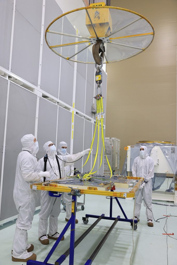 Technicians at the Astrotech Space Operations Facility near NASA’s Kennedy Space Center in Florida install the two-panel solar array on Thursday, July 17, 2025, that will help power the agency’s IMAP (Interstellar Mapping and Acceleration Probe) observatory on its upcoming journey one million miles away from Earth. Each panel of the solar array, located on the top of IMAP, consists of 16 strings of solar cells, with 36 cells per string, and combined will convert sunlight into 500 watts of power, more than enough for the observatory, which as a system uses less power than five 100-watt incandescent light bulbs.