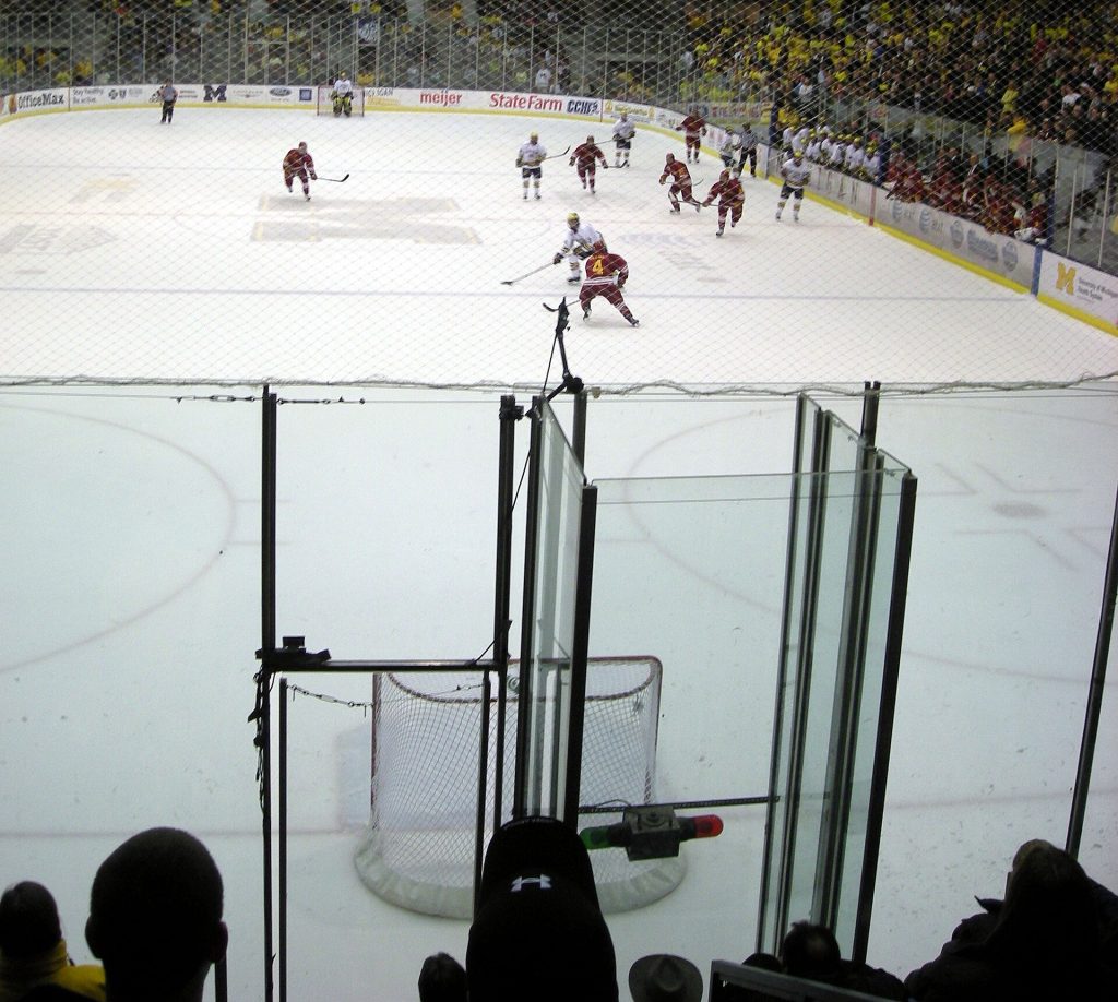 Michigan attempts an empty net goal during the Ferris State Bulldogs vs. Michigan Wolverines men's ice hockey game at Yost Ice Arena in Ann Arbor, Michigan (United States). Michigan won 2–0.