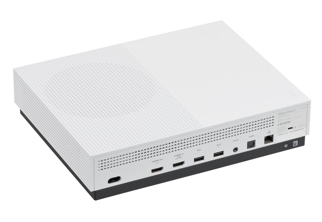 The Xbox One S, a video game console made by Microsoft and released in 2016. The "S" is a slimmer model of the previous One that was first released in 2013. Besides being smaller, the S has new features like HDR and 4K video from streaming and UHD Blu-Ray sources. This picture shows the back of the console, featuring the ports (from left to right): AC power in, HDMI out, HDMI in, 2x USB 3.0, IR out, S/PDIF and ethernet.