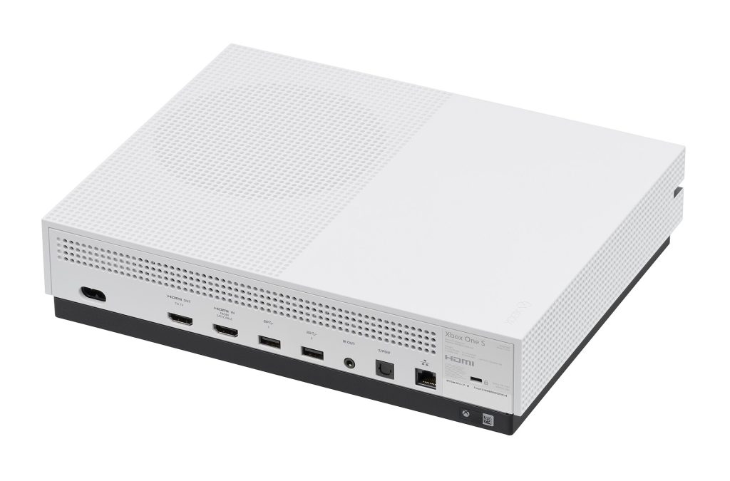 The Xbox One S, a video game console made by Microsoft and released in 2016. The "S" is a slimmer model of the previous One that was first released in 2013. Besides being smaller, the S has new features like HDR and 4K video from streaming and UHD Blu-Ray sources. This picture shows the back of the console, featuring the ports (from left to right): AC power in, HDMI out, HDMI in, 2x USB 3.0, IR out, S/PDIF and ethernet.