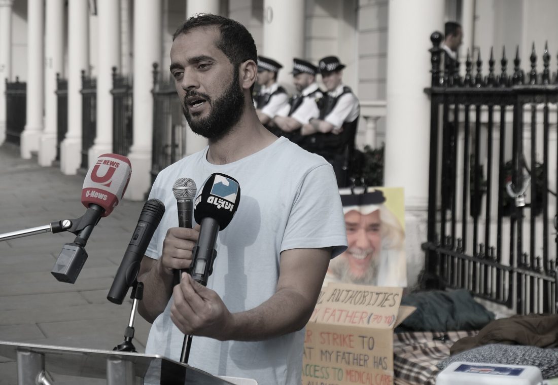 In front of Bahrain's embassy, democracy activist Ali Mushaima, gives a brief press conference on the 16th day of his hunger strike. He told journalists, with defiance and self confidence, that "my empty stomach is stronger than their (Bahrain's) weak and cowardly regime." After 16 days, Ali remains on hunger strike to save his 70 year old father, political prisoner Hassan Mushaima, detained in dire conditions in Bahrain since 2011. He has been denied access to books, family visits and urgently needed medical care. Ali has lost 7 kg and understands the serious consequences if he continues. Although tired, he's keen to talk about his father and his hopes.