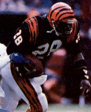Cincinnati Bengals running back Larry Kinnebrew rushing the ball against the Dallas Cowboys during a December 8, 1985 home game at Riverfront Stadium.