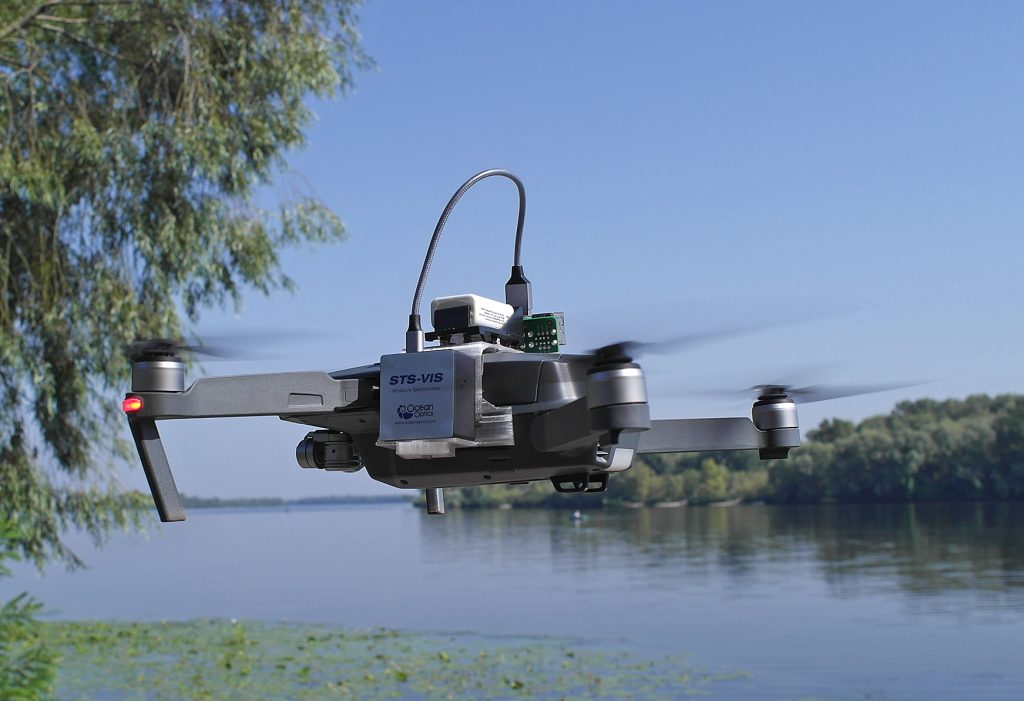 Quadrocopter DJI Mavic Pro additionally equipped with spectrophotometer Ocean Insight STS-VIS and supplementary equipment. Spectrophotometer captures surface refletance spectra in 350-800 range with 1 nm step. It is controlled by Arduino micro-computer and can be triggered remotely or work autonomously. The mount system was designed by Dr. Oleksandr Polishchuk during the project "Monitoring of anthropogenic pollution in freshwater bodies by remote sensing of water and aquatic vegetation" as a part of ERA-PLANET project funded by Horison 2020 framework program